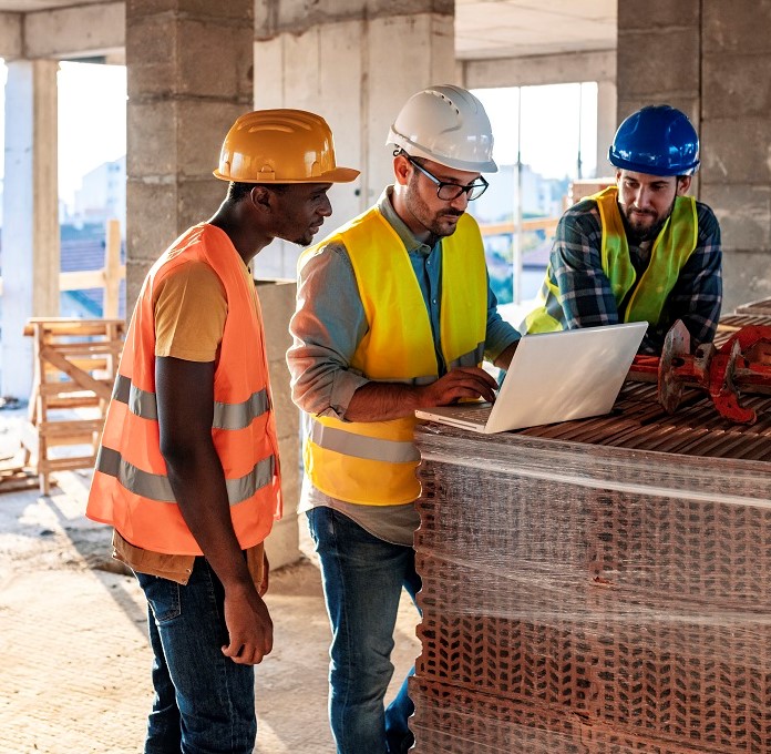 tradesmen on a building site