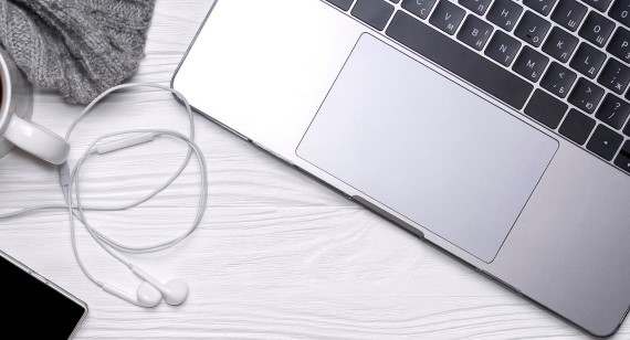 Coffee laptop and mobile phone on desk